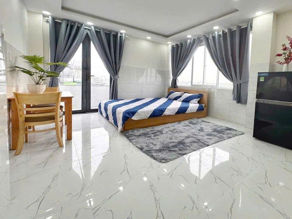 Căn hộ dịch vụ mới có hầm 6 lầu, hẻm xe hơi Thống Nhất ngang 9m, 180m2, gần trường 33,9 tỷ