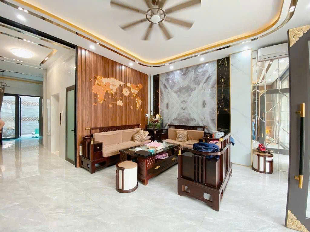 Bán nhà 7 tầng đẹp hẻm 656 Quang Trung ngang 6m có hầm thang máy ở ngay gần chợ 24 tỷ